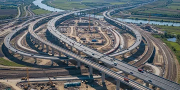 2026 Infrastructure Spending: Boosting Economic Growth with $2 Trillion Projects Modern infrastructure project under construction, symbolizing economic growth